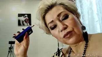 Hot Russian granny in a leopard costume smokes and talks about life until she starts sucking a young lover's dick...