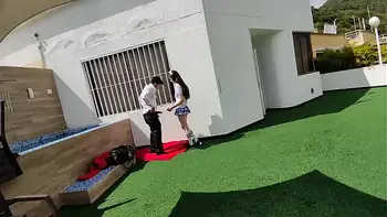 Young schoolboys have sex on the school terrace and are caught on a security camera.