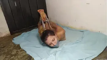 Hysterical Slut Hogtied Naked In The Basement