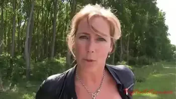 Young guy fucks an adult lady with beautiful boobs right in the forest