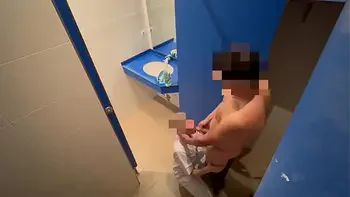 I surprise the gym cleaning girl who when she comes in to clean the toilet she catches me jerking off and helps me finish cumming with a blowjob