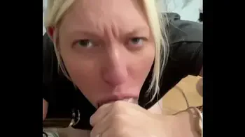 POV Blonde milf gives teasing blowjob inside a transparent cock sleeve