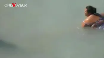 Beach Voyeur. Lucky guy caught BBW size mermaid in the sea