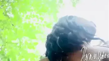 Adorable ebony fucking pussy in the park