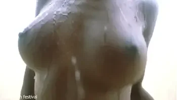 Skinny ebony village girl dancing naked in the rain with her perfect slim body