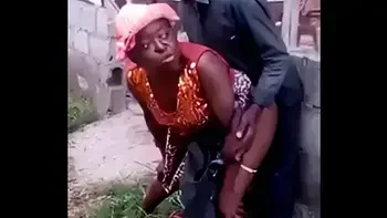 African woman fucks her man in public