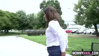 Horny MILF flashes her shaved pussy in a park - milf anal