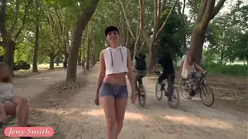 Jeny Smith walks the streets naked with only painted pants. Shocking footage