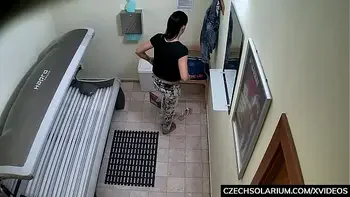 Beautiful Brunette Masturbating in Solarium