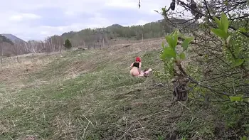 Voyeur spies on a girl with a big ass that masturbates outdoors. Organic masturbation with cucumber.