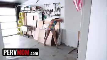 Stepmom and stepson get stuck in a garage, so they decided to fuck