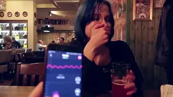 I took control of my stepsister's vibrator in the bar and brought her to orgasm.