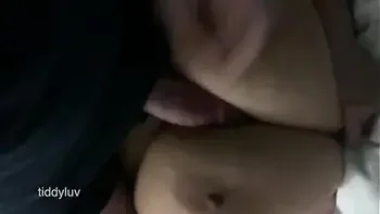 TITTYFUCKING AND CUMMING BETWEEN HER HUGE BOOBS