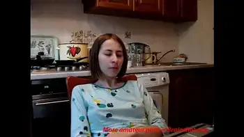 Teenie fingers to orgasm in kitchen