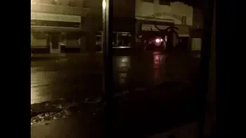 hangin out nude in a store front on main street