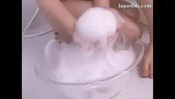 2 Asian Girls Soaping Each Others Rubbing Breasts Pussies In The Bath