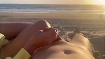 Public Handjob. Hand Job On A Nude Beach. We Were Caught Jerking Off At Sunset Near The Ocean