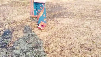 Desi Bhabhi RadhaDevi Pissing in Field Outdoor Hindi Webcam Masturbation