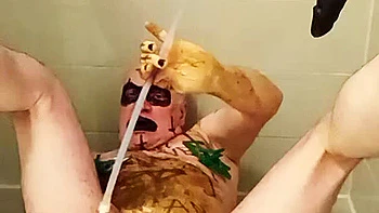 Satan slave takes perverted enema treatment