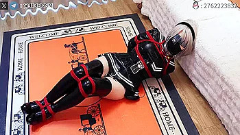 woman tied by red rope