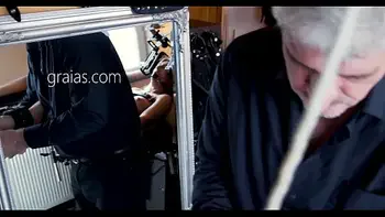 Cute blonde in a restrictive device