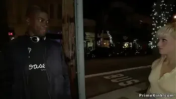 Gagged blonde is fucked in public