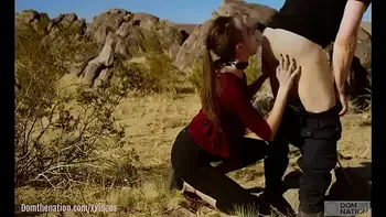 Petite, hardcore submissive masochist Brooke Johnson drinks piss, gets a hard caning, and get a severe facesitting rimjob session on the desert rocks of Joshua Tree in this Domthenation documentary