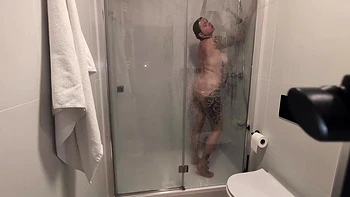 The Girl With Big Tits Takes A Shower And Masturbates