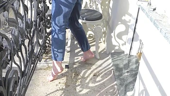 Wetting Jeans And Smoking On Balcony