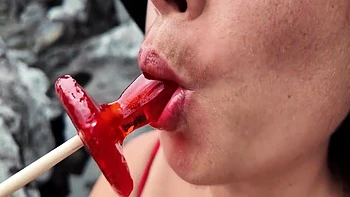 A Stepmom Practices Sucking On A Candy On The Beach. Then Tests Her Skills On Her Stepsons Dick