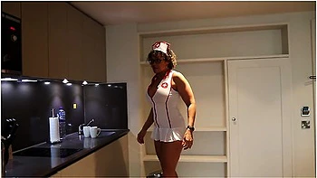 Nurse Comes To See Patient In His Room