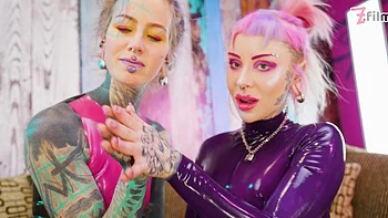 Tattooed trans Lily Lu gets two fists up her ass