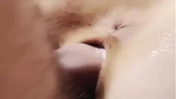 Doggystyle extremely close-up. Creampie