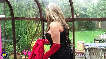 Horny British Granny Beverly Undresses & Masturbates in Front of the Window