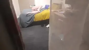 Girl caught masturbating through the window