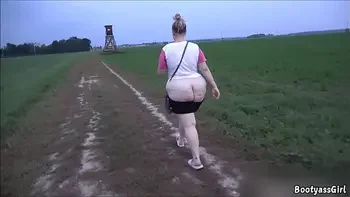 Naughty girl shows her huge ass during a walk and then blows cock
