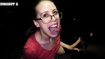 Girlfriends sharing a cock through a glory hole.