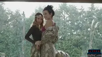 Four pretty lesbian girlfriends get naked on the beach