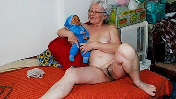 Granny with hairy pussy Agnes plays with her pink wet vagina