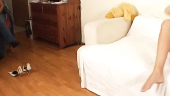 Malina sticks her palm in Tina Martinez's shaved pussy from behind