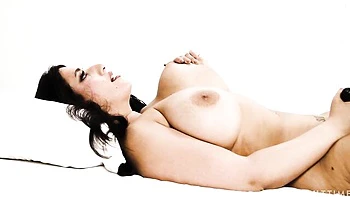 Brunette chick Sarah Arabic is touching her wet shaved pussy