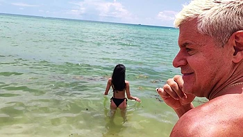 Four hot babes fuck with guys in a steamy beach scene.