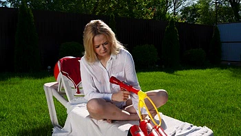 Blonde model Lina Shisuta caresses her slim body and shaves her pussy