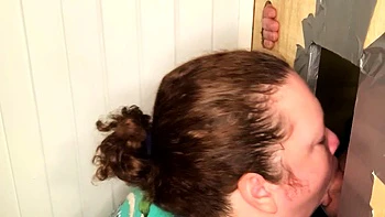 Brunettes sucking cocks through glory holes