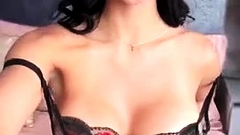 Busty curly brunette with big boobs fucks on couch