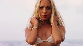 Sun's out, fun's out: Erik and angelic Angie get sandy in a steamy seaside romp