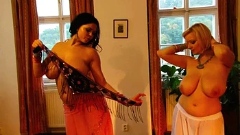 Sophie Mei and friend strip dance with big tits