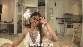 Young Thai girl with braces interviews for a maid job