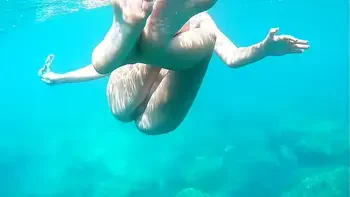 swimming without panties is so good while others are watching.Mala dvojka