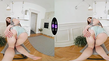 Redhead Vilora Efi fingers her juicy shaved pussy in VR